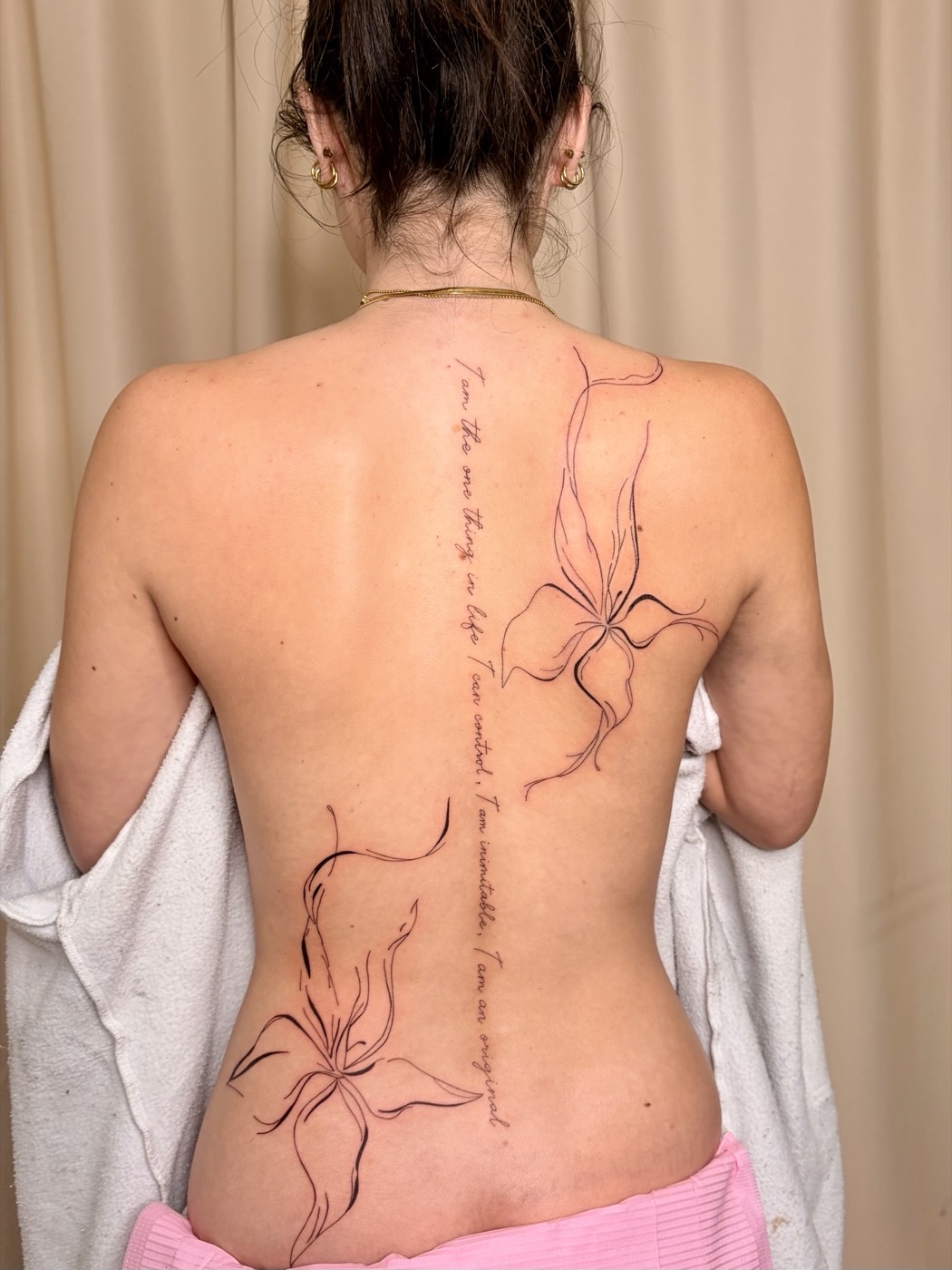 Fine line back tattoo Perth - floral spine design by The Evie Edit