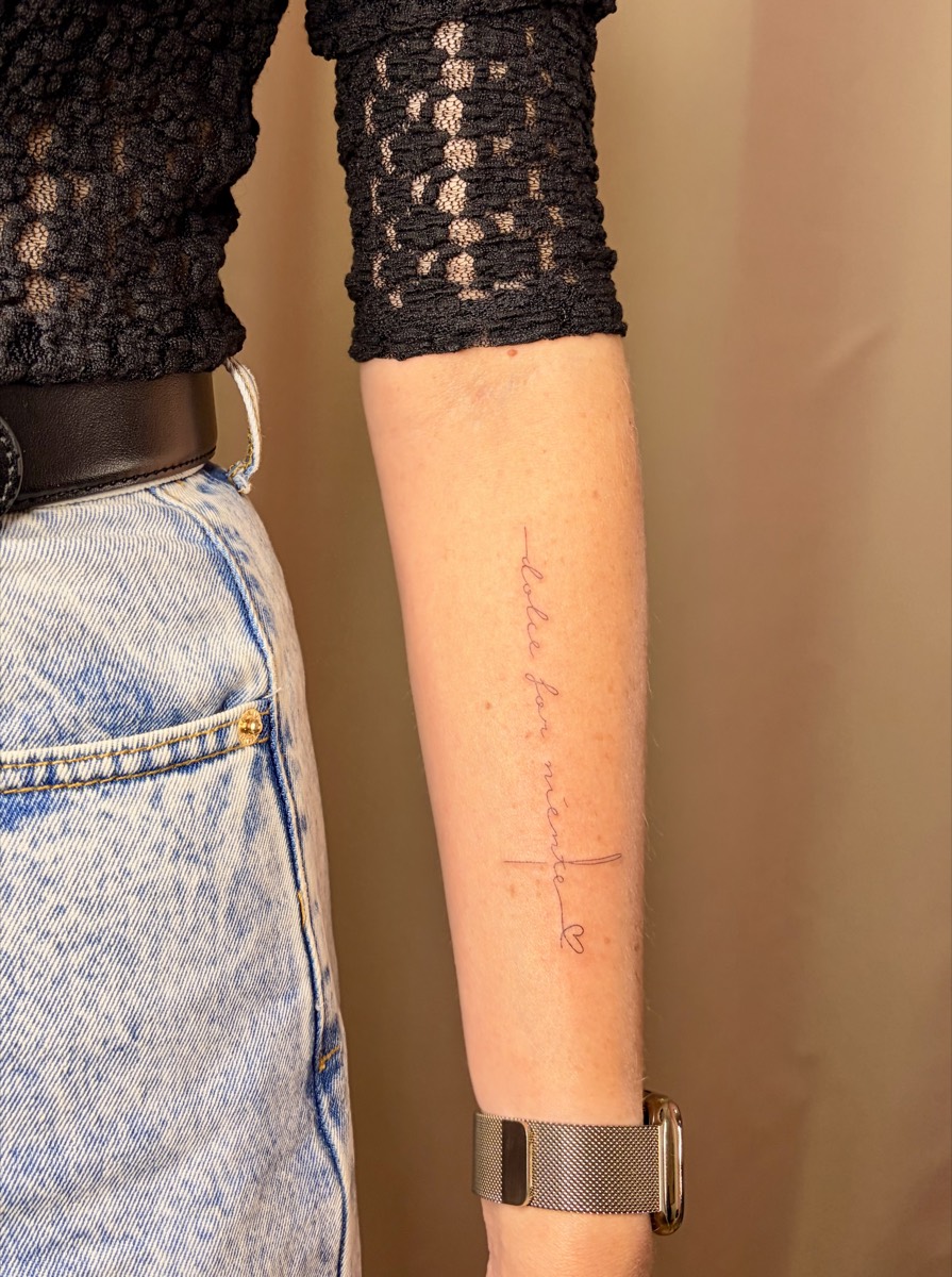 Fine line script tattoo on forearm Perth