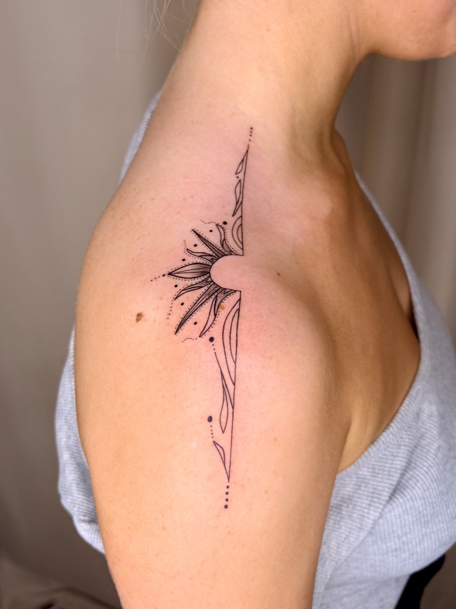 Delicate fine line sun tattoo on shoulder - The Evie Edit Perth